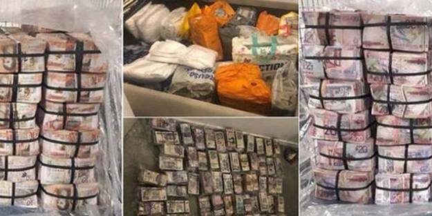 Baskın yapılan evde şok görüntü! Her yerden dolar fışkırdı