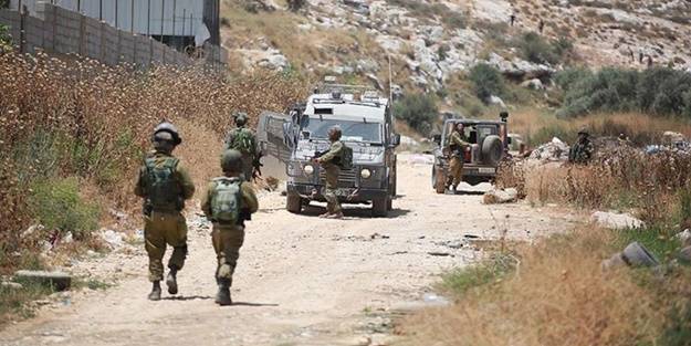 Batı Şeria'da terörist İsrail 3 Filistinliyi yaralandı