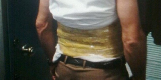 Beline sardığı eroinle yurtdışına çıkmak istedi