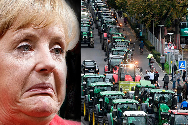 Berlin'de çiftçilerden Merkel hükümetine ilginç protesto