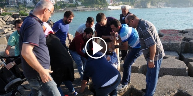 Beton blok arasına düşen küçük çocuğu imam kurtardı
