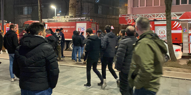 Binada çıkan yangını film izler gibi izlediler!