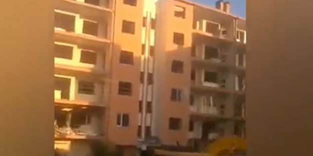 Bir taş attı 5 katlı bina yıkıldı! Hayrete düşüren anlar böyle kaydedildi