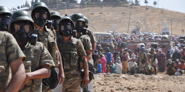 Bir yanda Esed, bir yanda PYD