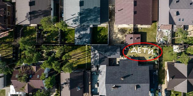 Bombadan böyle korunuyorlar! Ukraynalı aile evinin bahçesine bakın ne yazdı