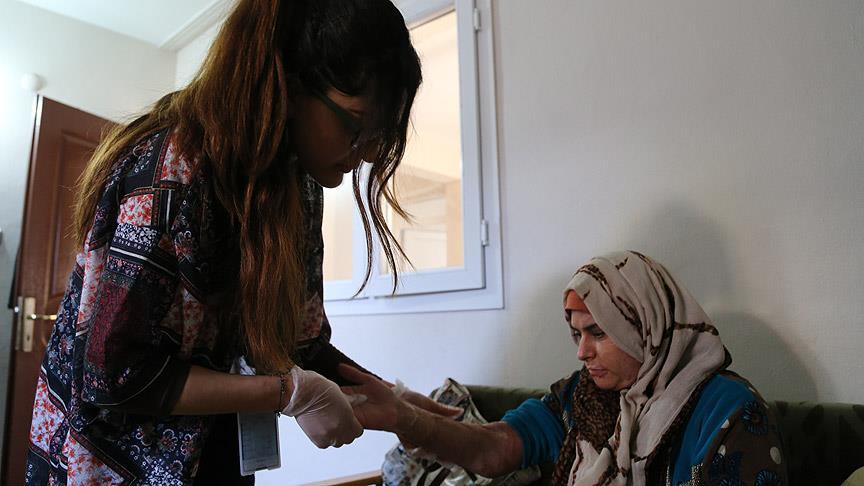 'Bombaların yaktığı' anne ile oğlu tedavi ediliyor