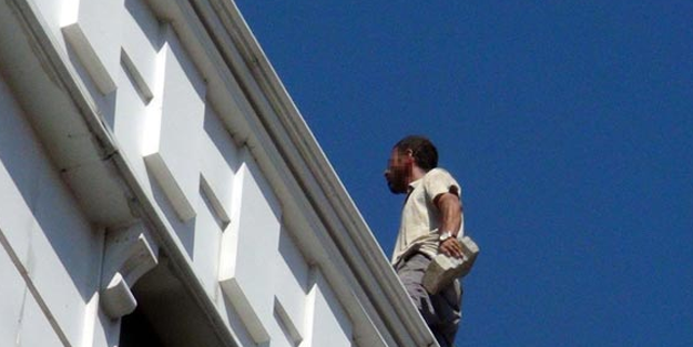 Borçlu olduğu mağazanın çatısından kendini atmaya çalıştı!