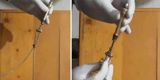 Boynunda kolye görünümlü silahla yakalandı!