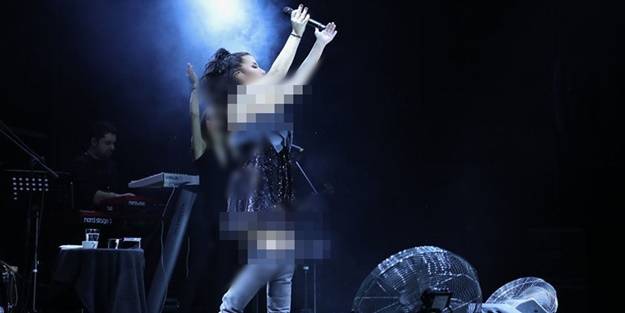 Bu ahlaksızlığa kim dur diyecek? İrem Derici sahneye eşcinsel sapıkların renklerinden oluşan paçavra ile çıktı!