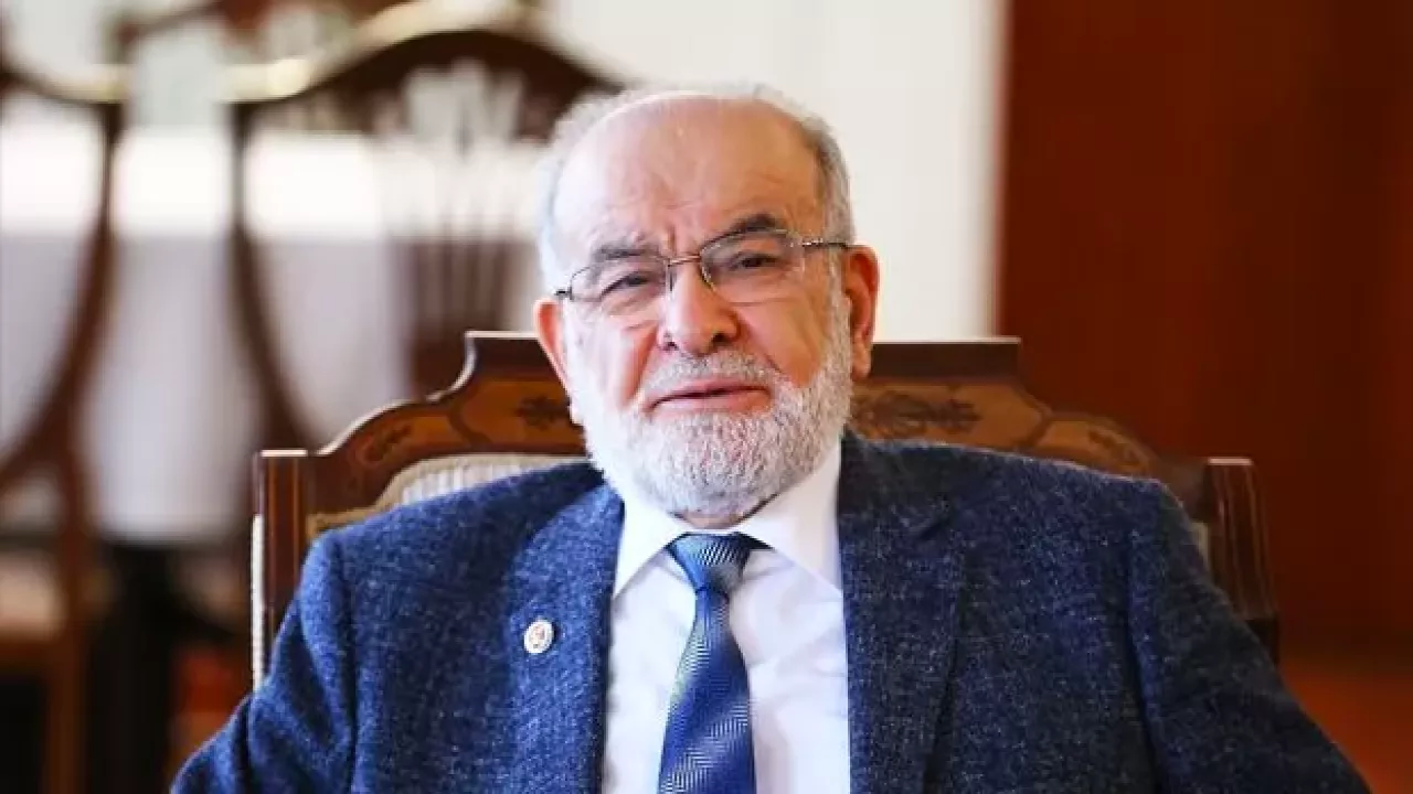 Bu kara leke, Temel Karamollaoğlu'nun alnına yapışır