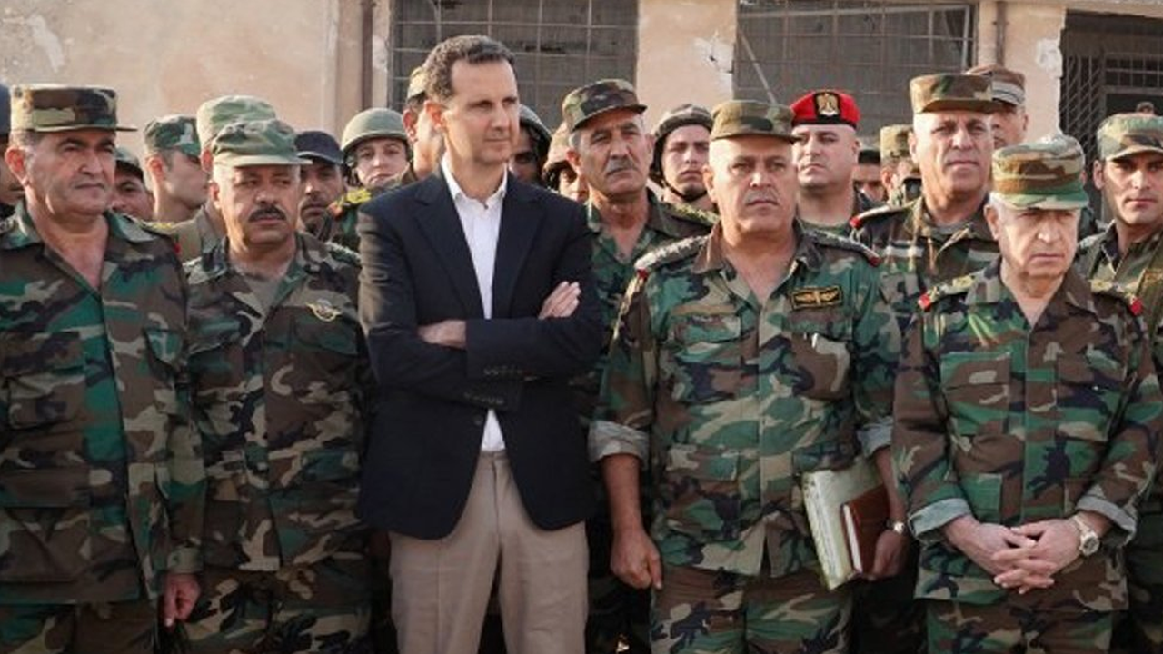 Bunlar ne zaman kurşuna dizilecek! Esad'a bağlı katliamcı askerler Irak'a sığındı!