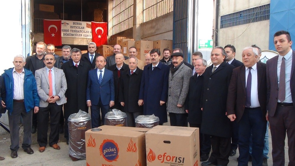 Bursalı sobacılardan ısıtan yardım 