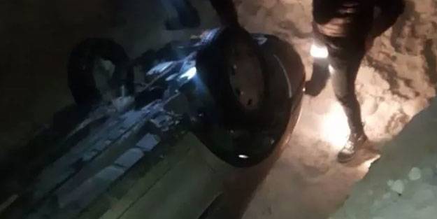Buzlu yoldan kayan araç su kanalına uçtu