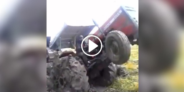 Çamura saplanan traktörünü şaha kaldırdı