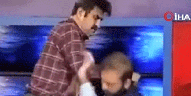 Canlı yayında tekme tokat kavga!