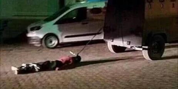 Cesedi sürükleyen polisler meslekten atıldı