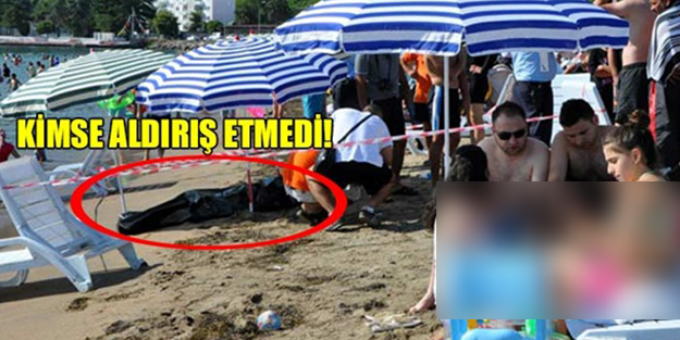 Cesede aldırış etmeden yemek yediler, güneşlendiler