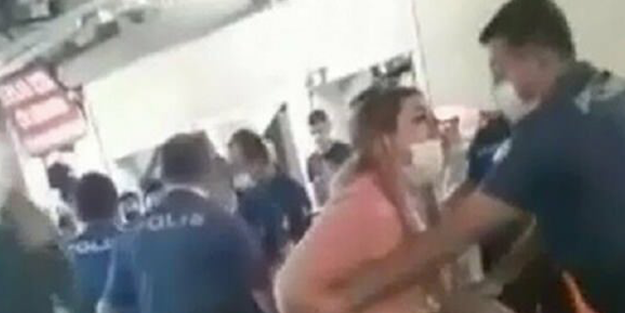 Ceza sonrası polise yumruk attı