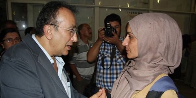 CHP'den başörtülü gazeteciye canlı bomba muamelesi!