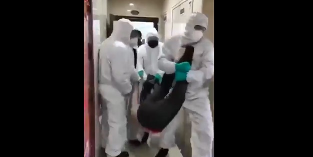 Çin'de insanlar evlerinde yaka paça gözaltına alınıyor