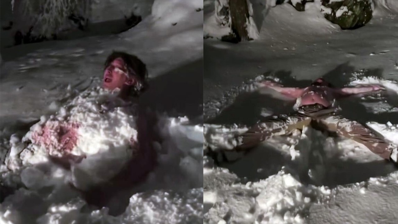 Çocuk gibi eğlendi! Dondurucu soğukta kar banyosu yaptı