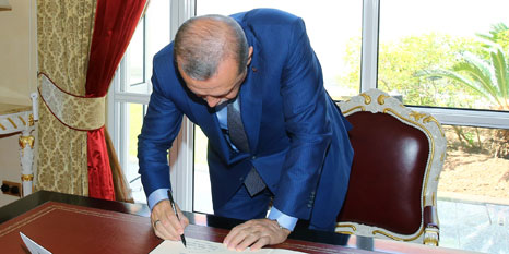 Erdoğan dokunulmazlık yasasını onayladı