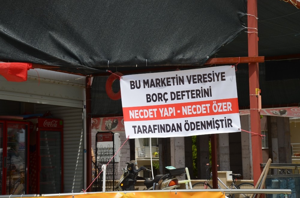 Didimli hayırsever 3 veresiye defterinin borcunu kapattı 