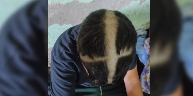 Dost diye yutturulmaya çalışılan haçlı Macaristan: Macar polisi Faslı mültecinin kafasına haç kazıdı