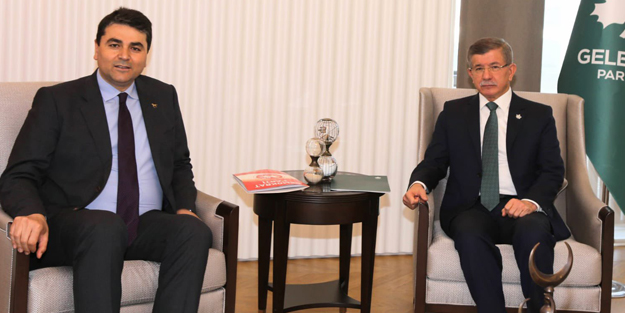 DP lideri Gültekin Uysal ile görüşen Davutoğlu'nun asık suratı dikkat çekti
