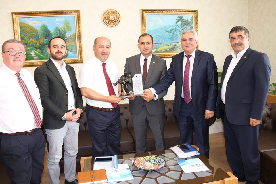 Dumlupınar heyetinden Müdür Başyiğit’e ‘hayırlı olsun’ ziyareti 