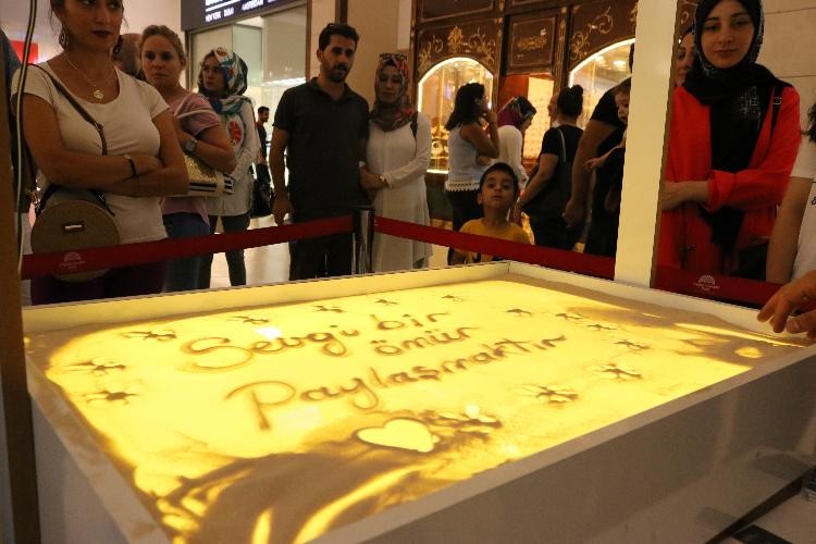 (Düzeltme) Gençlerden kum saati etkinliği 