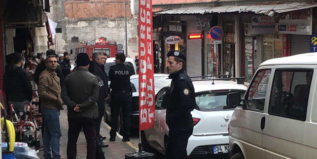 Elindeki benzin bidonuyla berberi rehin aldı!