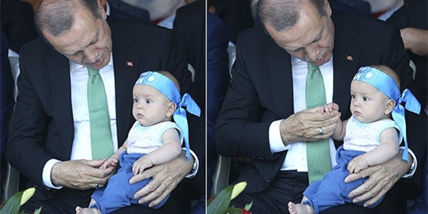 Erdoğan, Suriyeli bebek adaşını sevdi