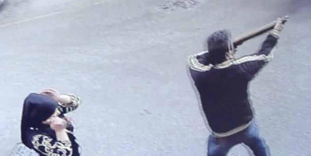 Eşinin çantasından çıkardığı tüfekle sokak ortasında dehşet saçtı