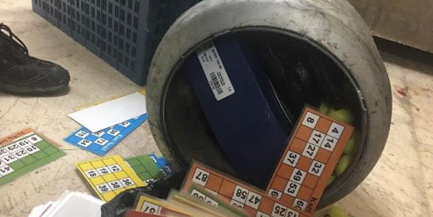 Eskişehir'de kumar baskını! Mutfak tüpü içinden tombala kağıtları çıktı