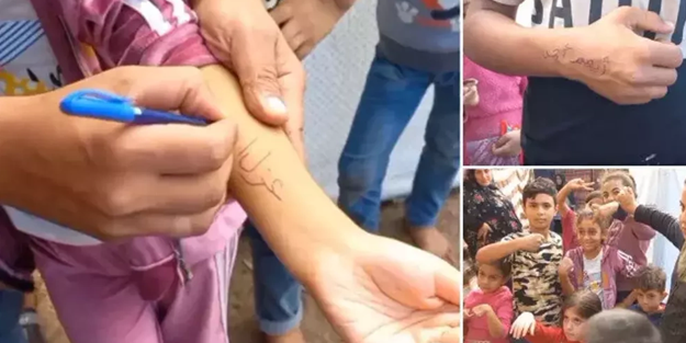 Filistinliler, şehit olan çocuklarını tanıyabilmek için kollarına isimlerini yazıyor