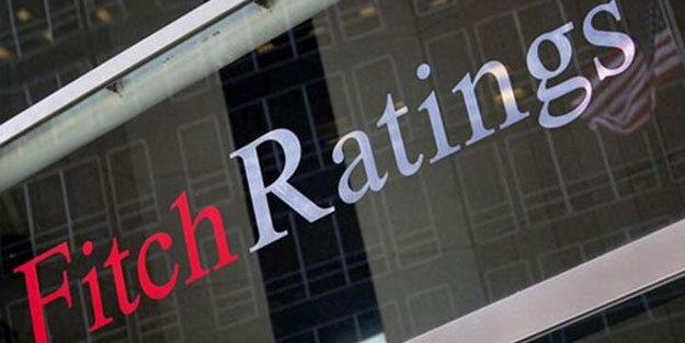 Fitch küresel ekonomi tahminini düşürdü