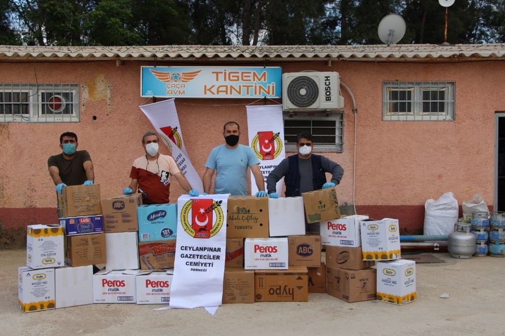 Gazetecilerden 37 aileye gıda yardımı 