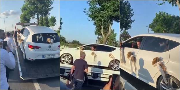 Gelin arabası arızalanınca düğün salonuna çekicinin üzerinde gittiler