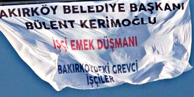 Grevdeki Bakırköy Belediyesi işçileri 15 Temmuz Şehitler Köprüsü'ne pankart astı