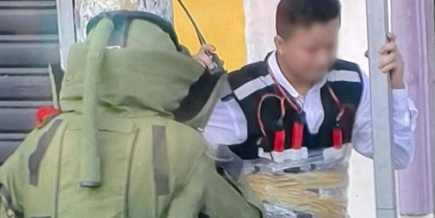 Güvenlik görevlisinin üzerine dinamit bağlanıp sokağa bıraktılar!