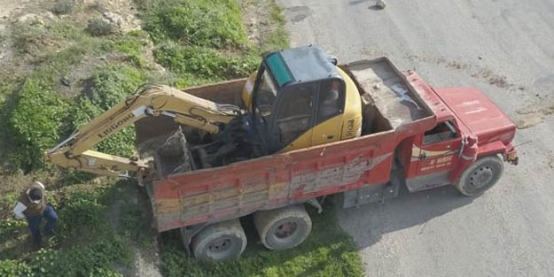 Haberlere konu olan iş makinası, bulunarak sahibine teslim edildi