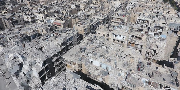 Halep'te 5 katlı bina çöktü: Ölüler var