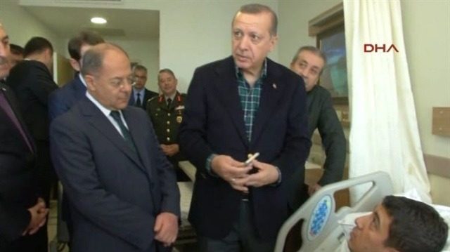 Hayatını kurtaran telefonu Cumhurbaşkanı Erdoğan'a gösterdi