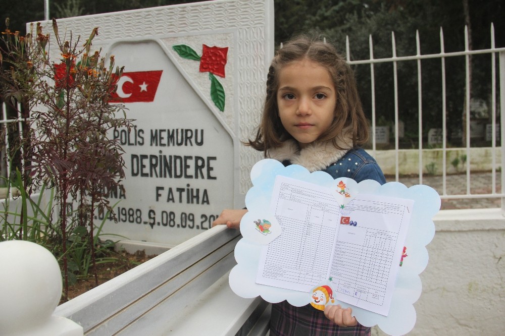 İlk karnesini şehit babasına götürdü 