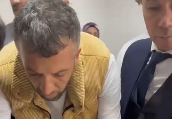 Oy kullanırken gözaltına alındı