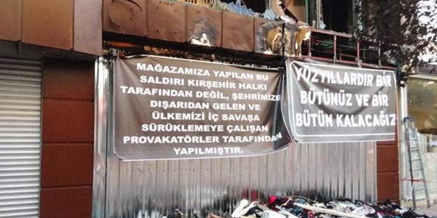İş yeri yakılan Kürt esnaf öyle bir pankart astı ki...