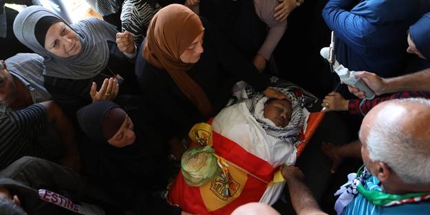 İsrailli teröristlerin öldürdüğü Filistinli çocuk toprağa verildi! Bir daha saldırdılar