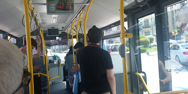 Otobüse binen yolcu maskeyi indirdi ortalık karıştı! 