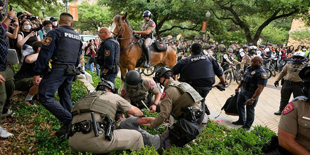 İşte CHP'nin özendiği Batı'nın kirli yüzü! ABD'de katliama karşı çıkan üniversite öğrencilerine joplu gözaltı